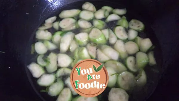 Sponge gourd, tofu and preserved egg soup