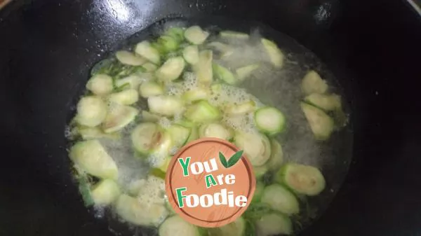 Sponge gourd, tofu and preserved egg soup