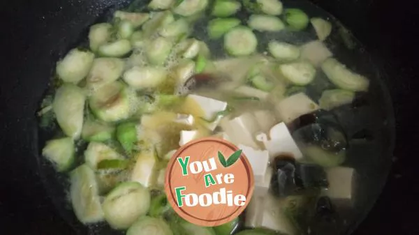 Sponge gourd, tofu and preserved egg soup