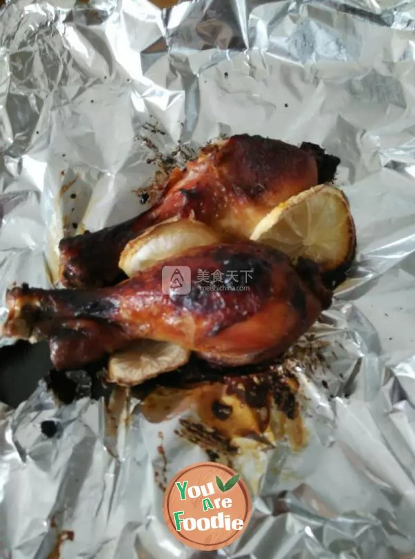 Roasted chicken leg with lemon