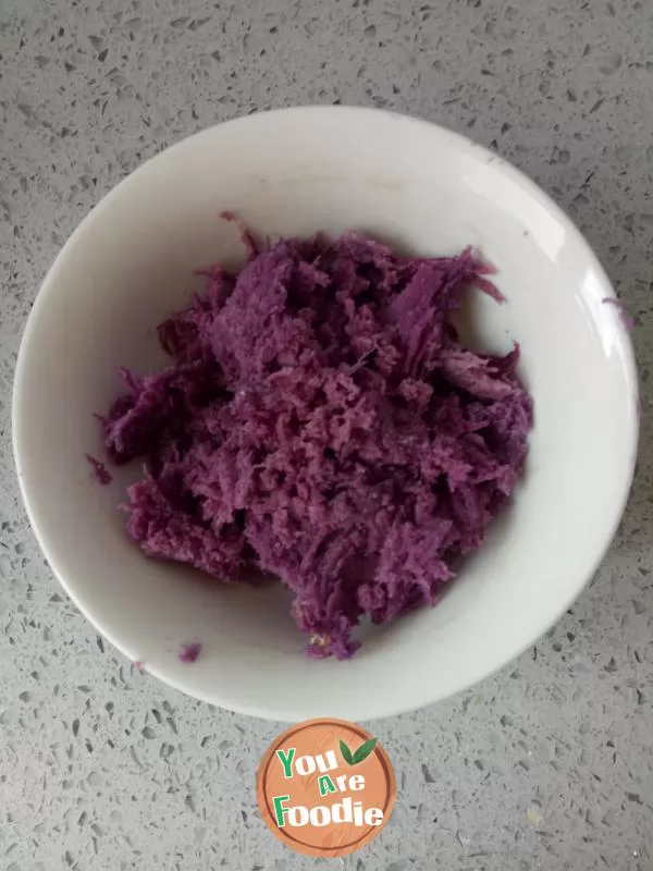 Fried dumplings with purple potato, rose and egg