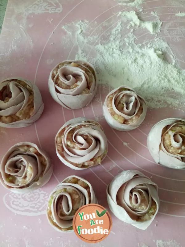 Fried dumplings with purple potato, rose and egg