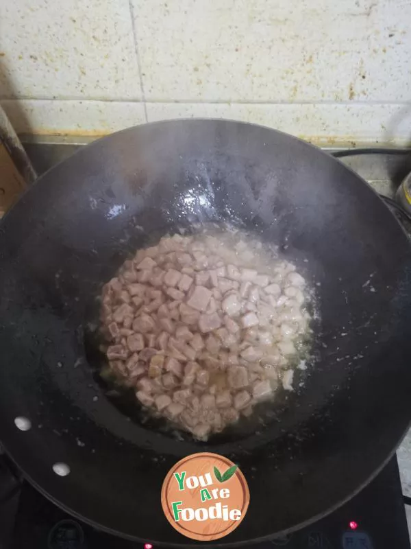 Stir fried pork with garlic sprouts