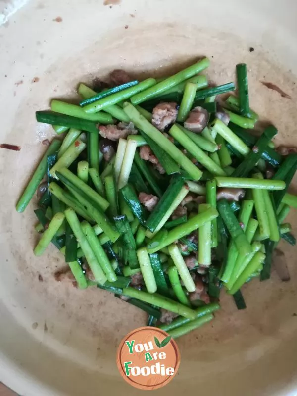 Stir fried garlic sprouts with minced meat