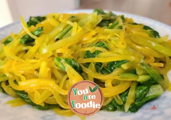 Stir fried lettuce with shredded pumpkin