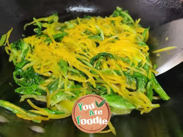 Stir fried lettuce with shredded pumpkin