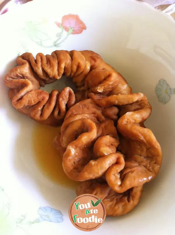 Sauted large intestine with preserved vegetables