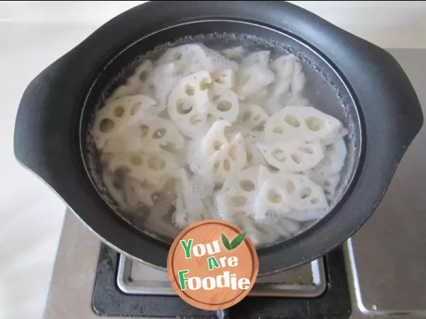 Lotus root slices with sea rice and scallion oil