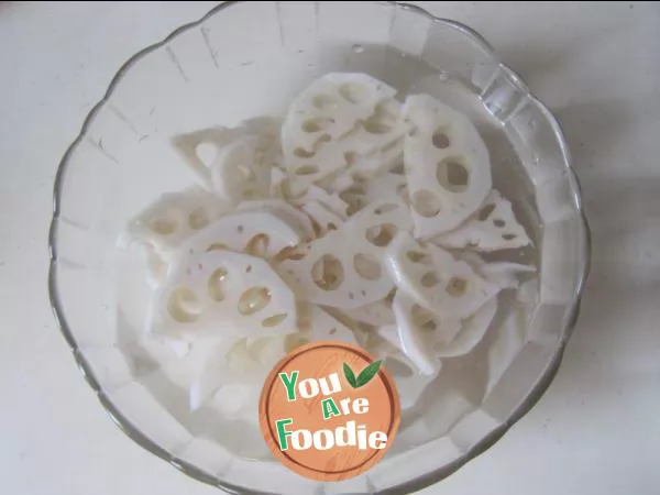 Lotus root slices with sea rice and scallion oil