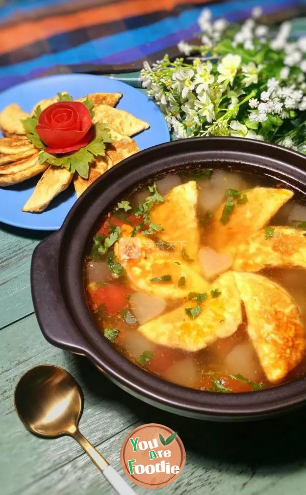 White gourd tomato egg dumpling soup