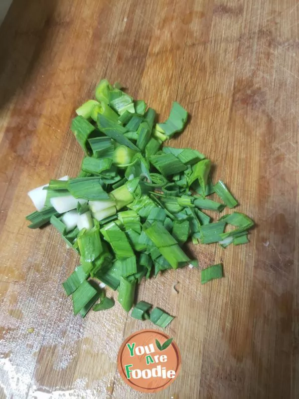 Stir fried white radish shreds with red vegetable moss