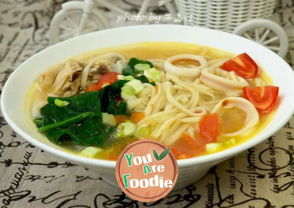 Squid noodles in chicken soup