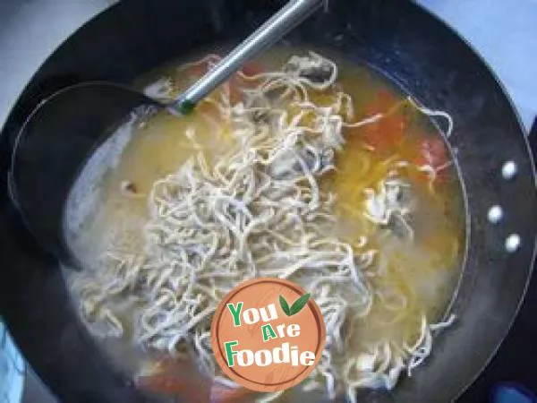 Squid noodles in chicken soup