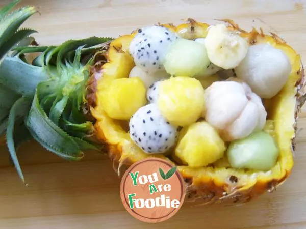 Pineapple boat fruit salad