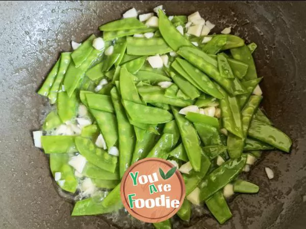 Stir fried lotus beans with minced garlic