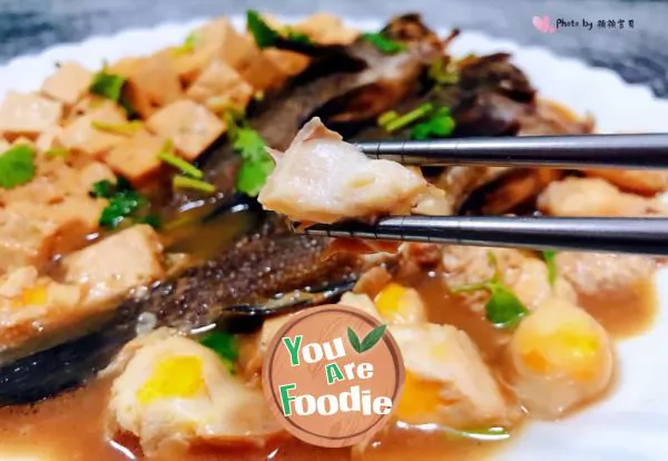 Stewed black fish with quail eggs and tofu