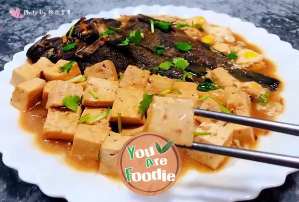 Stewed black fish with quail eggs and tofu