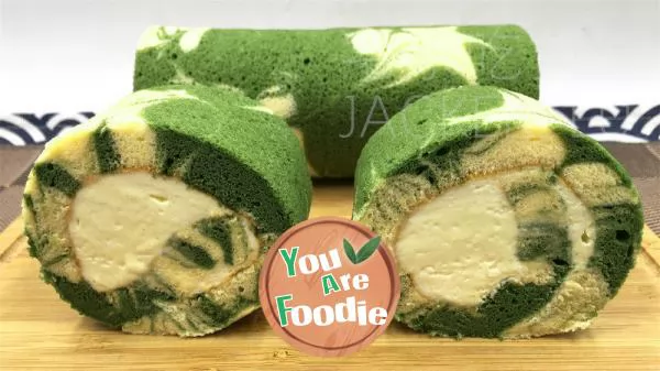 Matcha-marble-patterned-cake-roll,-with-a-subtle-bitterness-and-sweetness-that-complement-each-other,-leaving-a-lasting-impression