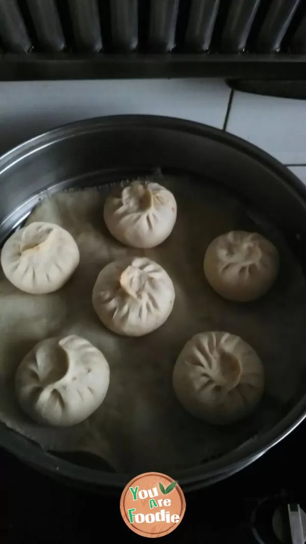 Steamed stuffed bun with carrot, egg, agaric, shrimp skin