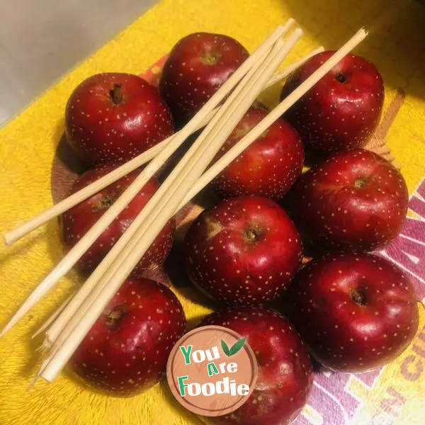 candied gourd on a stick