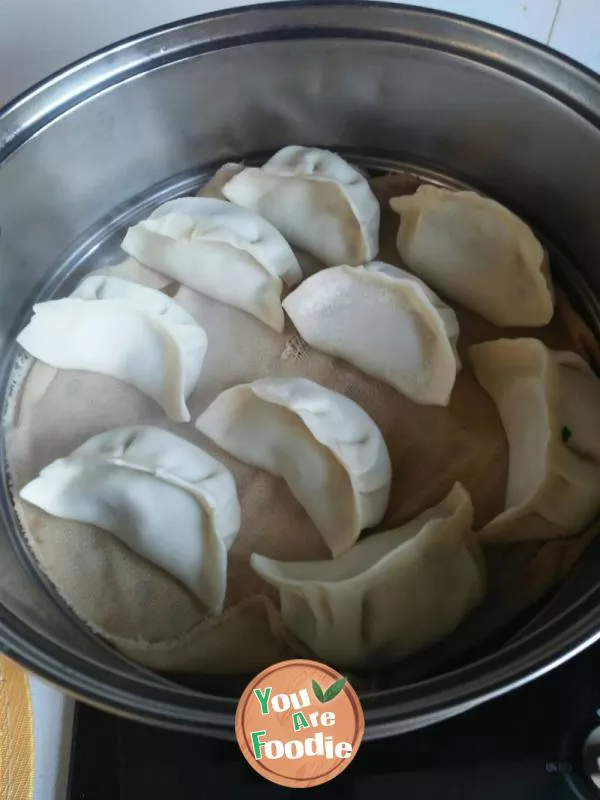 Dumplings stuffed with white gourd, celery and meat