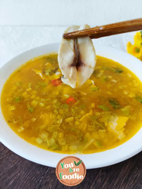 Fish fillet in golden soup