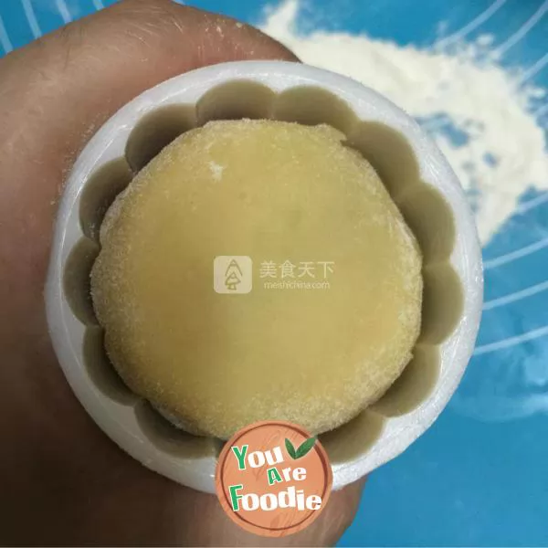 Cantonese style moon cake with lotus seed paste and egg yolk