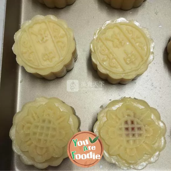 Cantonese style moon cake with lotus seed paste and egg yolk