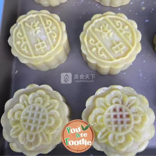 Cantonese style moon cake with lotus seed paste and egg yolk