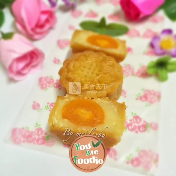 Cantonese style moon cake with lotus seed paste and egg yolk