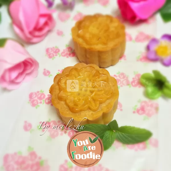 Cantonese style moon cake with lotus seed paste and egg yolk