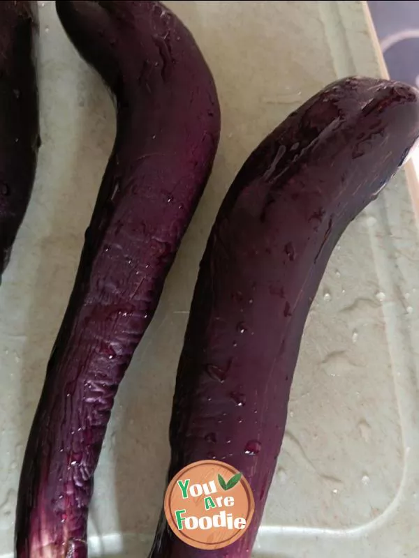 Purple eggplant with mashed garlic