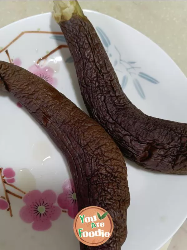 Purple eggplant with mashed garlic