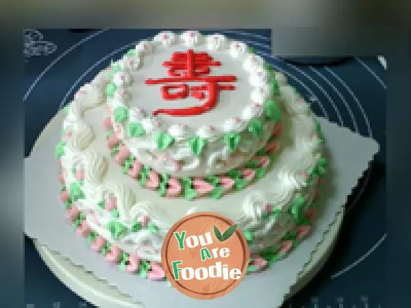 Decorated cake: auspicious cloud for longevity