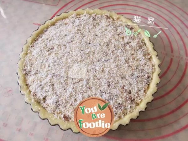 Coconut flavored walnut pie