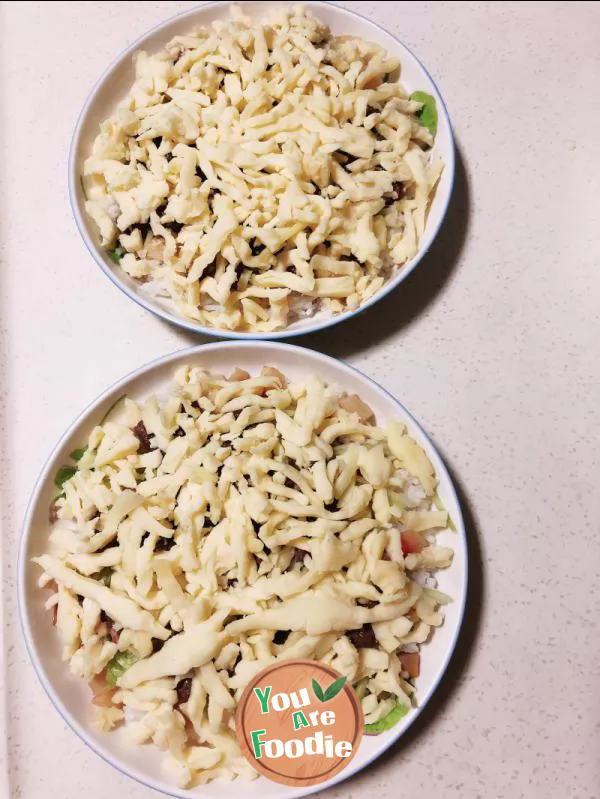 Baked rice with beef and cheese with black pepper