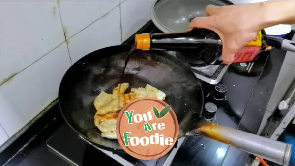 Fried dumplings in soy sauce