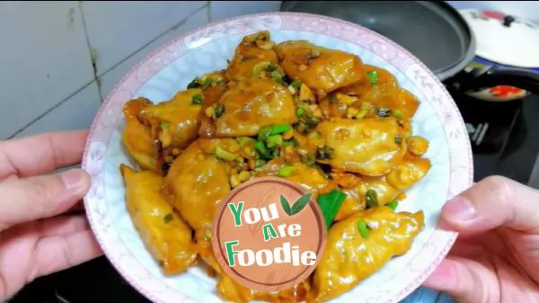 Fried dumplings in soy sauce