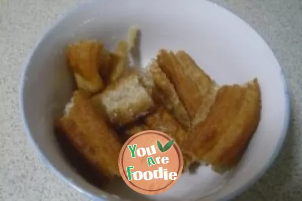 Towel gourd and fried dough sticks soup