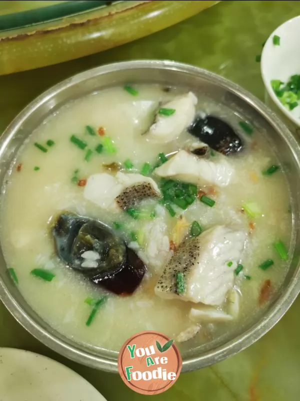 Porridge with preserved eggs and perch