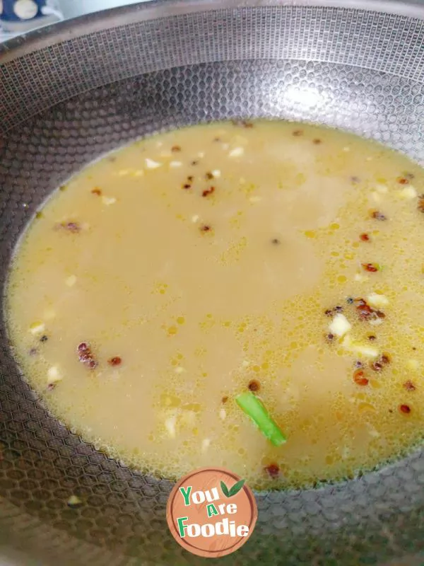 Beef in golden soup