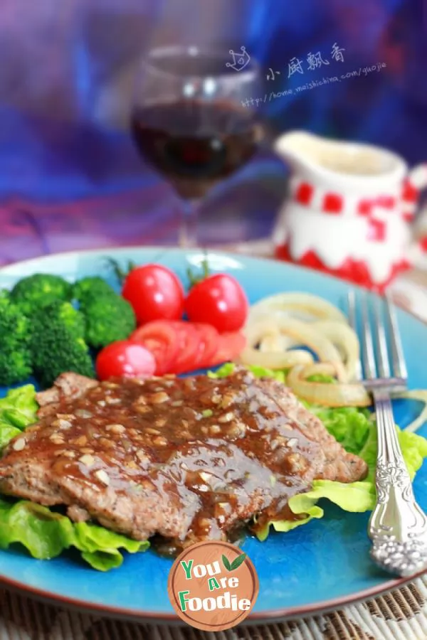 Beef steak with red wine and black pepper