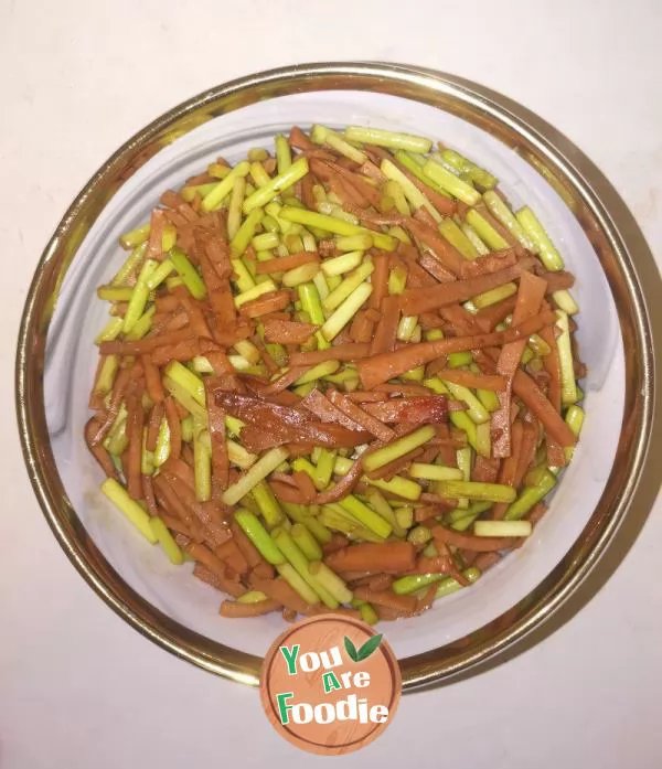 Stir fried ham sausage with garlic sprouts