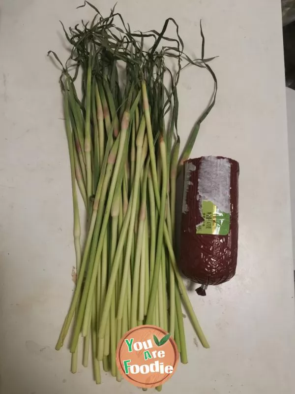 Stir fried ham sausage with garlic sprouts