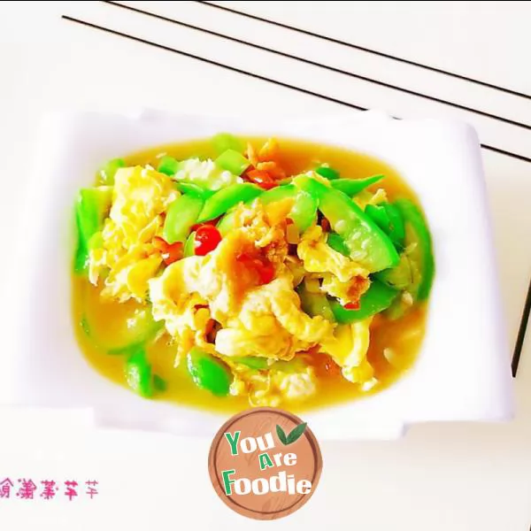 Fried egg with towel gourd