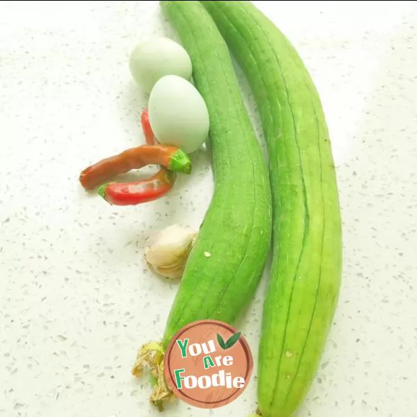Fried egg with towel gourd