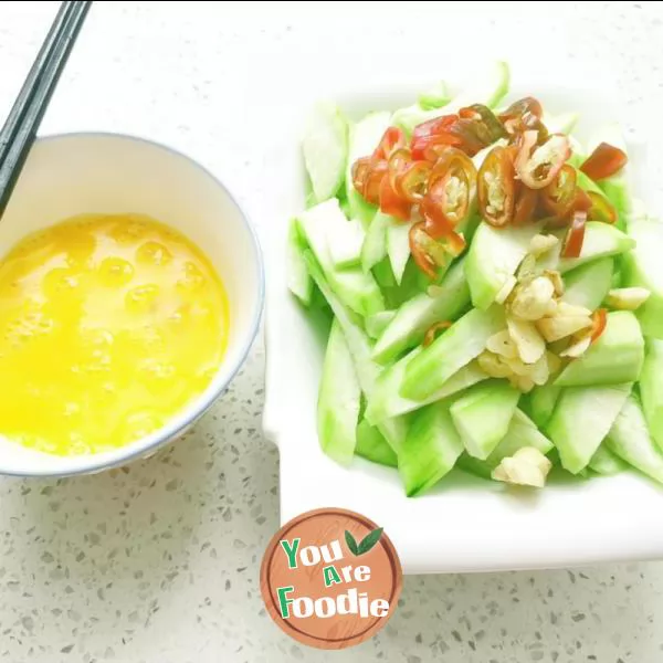Fried egg with towel gourd
