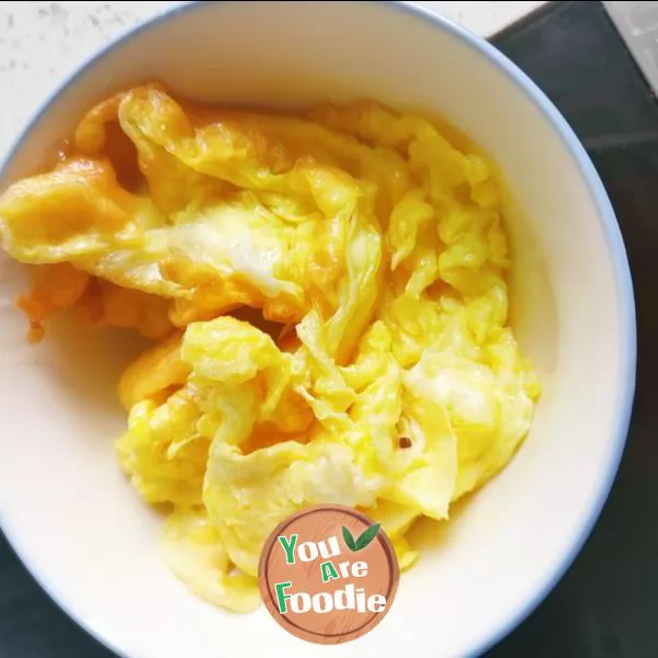Fried egg with towel gourd