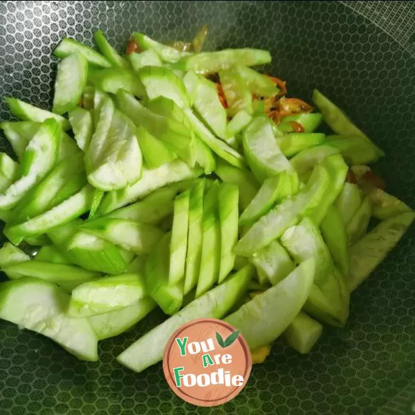Fried egg with towel gourd