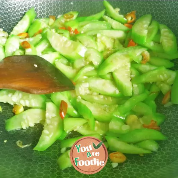 Fried egg with towel gourd